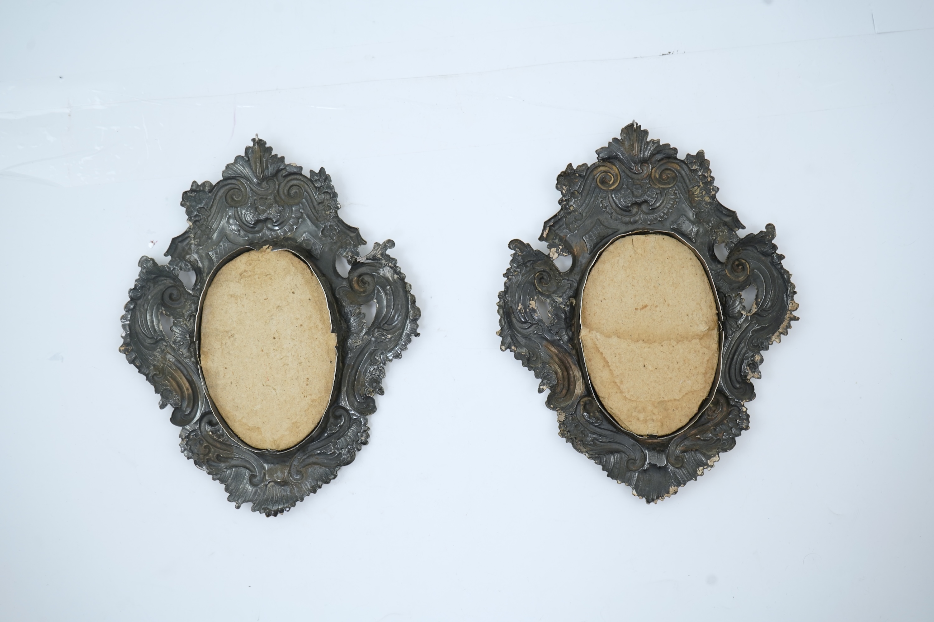 A pair of 18th century Italian Rococo repousse silver frames
